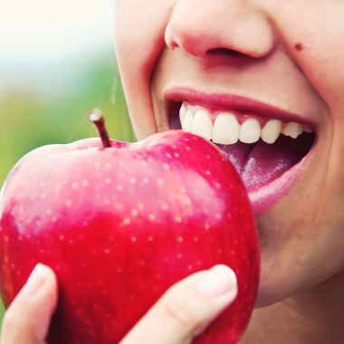 Biting an apple