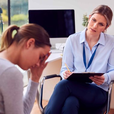 Patient talking with health professional