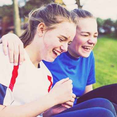 Friends laughing together