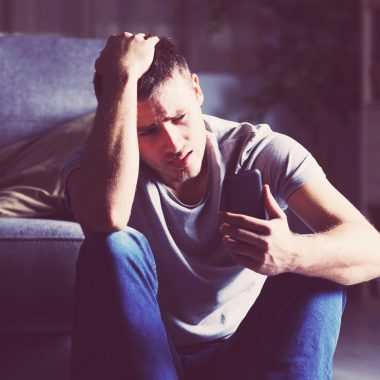 Teen checking his phone