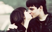 Teenage couple kissing