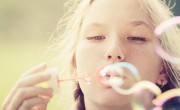 Girl blowing bubbles