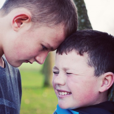 Bully picking on smaller boy