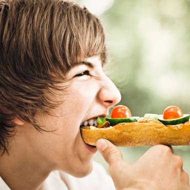 Boy eating a healthy sandwich