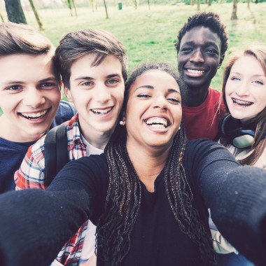 Friends taking selfie in the woods